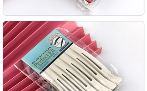 Close-up of cream-colored seamless duckbill hair clips with Japan Technology packaging