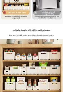 Close-up of various sizes of white plastic storage bins for kitchen cabinet organization