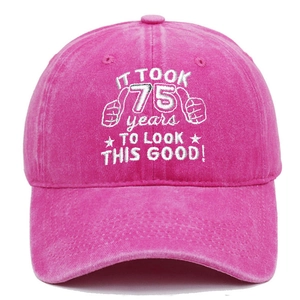Deep pink washed cotton baseball cap with 75th birthday embroidery in a frontal view