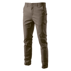 Detail of tan men's cotton chinos showing twill texture, pockets and belt loops