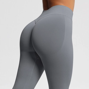 Close-up of seamless high-waisted grey yoga leggings with arched lifting contour lines