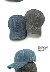 Detail view of structured denim jacquard baseball caps in blue and gray textured fabrics
