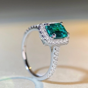 Elegant S925 sterling silver ring with emerald cut green zircon and pavé diamond band