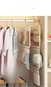 Vertical multi-layer drying rack for socks and small items inside a closet wardrobe