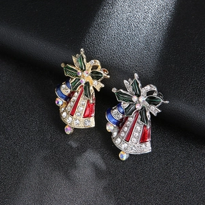 Christmas bell brooches with red and blue enamel, green leaves and crystal bowknot detail