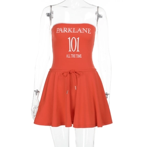 Detail of red tube top dress with PARKLANE 101 print and adjustable drawstring waist