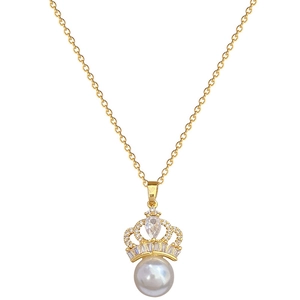 Elegant gold crown necklace set with white pearl and sparkling crystals on white background