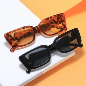 Retro rectangle sunglasses in black and tortoiseshell finish with gold V detail
