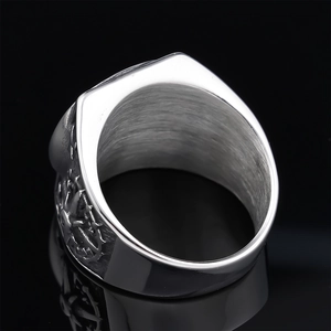 Polished stainless steel Viking ring for men featuring Nordic cross and thorn relief