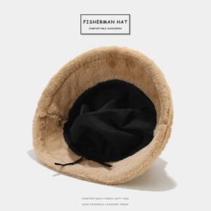 Plush khaki fisherman hat with black lining and adjustable drawstring on white background