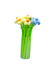 Macro view of crochet flower gel pens with green leaf stems in a clear cylinder
