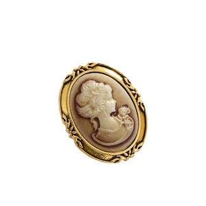 Vintage palace style oval brooch featuring a lady portrait relief in gold finish