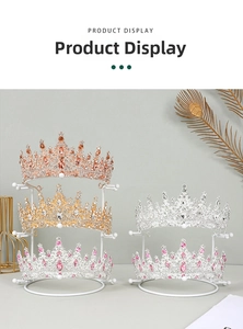 Detailed display of assorted bridal crowns on a golden metal stand for professional display