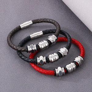 Braided leather bracelets in brown, black, and red with polished magnetic metal clasps