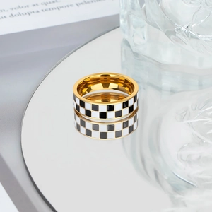 Classic gold stainless steel ring with black and white checkerboard pattern inlay
