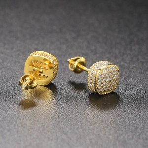 Macro detail of gold plated square hip hop stud earrings with micro-pave cubic zirconia