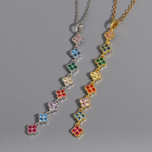 Vertical row of colorful zircon clovers in gold and silver plating necklaces