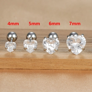Detailed comparison of 4mm to 7mm heart-shaped zircon studs with steel ball backings