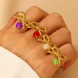 Pastoral style bow rings with colorful beads in purple, red, white, and green