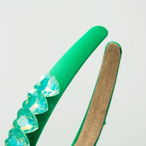 Baroque green satin headband with four sparkling heart crystals in a luxury fashion style