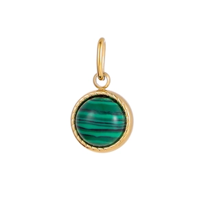 Detailed macro view of a vintage bohemian round gold pendant with green malachite stone