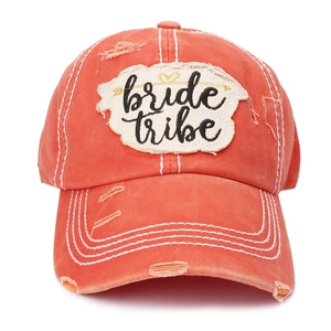 Distressed coral baseball cap with embroidered Bride Tribe patch and heart arrow