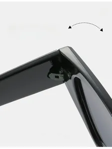 Close-up of durable metal hinges on sleek black cat eye sunglasses for women