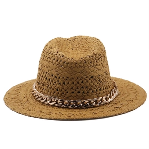 Handwoven straw jazz hat in camel with a chunky light gold chain decoration