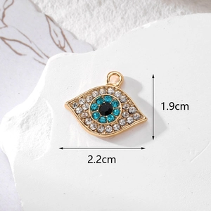 Golden alloy Evil Eye pendant with blue rhinestones for DIY jewelry, 2.2cm x 1.9cm