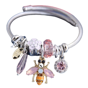Silver charm bracelet with pink crystal beads, enamel bees and floral charms