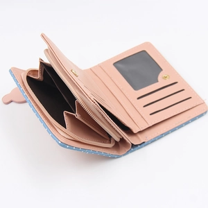 Blue polka dot short wallet with pink interior, card slots and zipper pocket for women