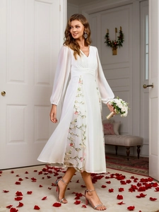 Elegantes weißes V-Ausschnitt-Midikleid mit Laternenärmeln und Blumenstickerei