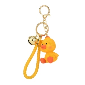 Cute resin yellow duck keychain with braided leather strap and golden metal ring