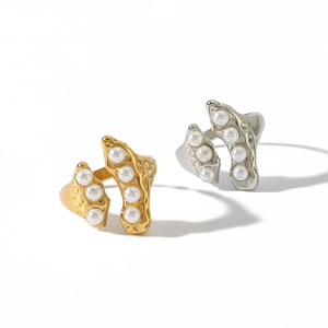 Vintage geometric stainless steel rings in gold and silver with pearl accents