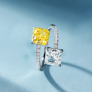 Macro shot of two-tone square crystal open ring with polished silver pave band