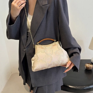 Vintage champagne satin handbag with floral embroidery and wooden handle for autumn