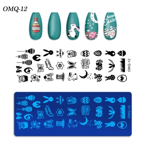 Close-up of OMQ-12 Easter nail stamping plate with rabbits, eggs, and flower patterns
