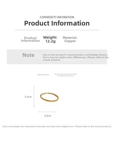 Detail view of gold-plated arrow textured bracelet with copper material specs