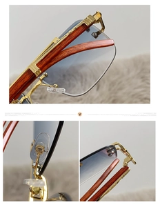 Detail view of gold metal hinges, gradient blue lenses, and wooden arms on aviator glasses