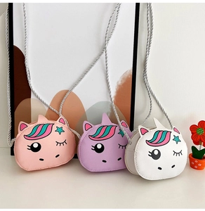 Detailed view of unicorn shoulder bags for girls in pink, purple and white colors
