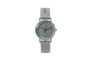 Close-up of gray silicone watch dial with numeric markers and a small heart motif