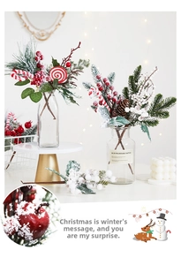 Macro detail of Christmas pine branches with red berries and candy cane ornaments
