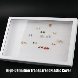 White jewelry display box with transparent lid and sponge slots for multiple earrings