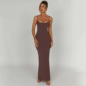 Detail view of a slim-fit backless brown maxi dress with spaghetti straps and elegant slit