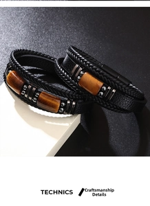 Close-up of men's layered leather bracelet with brown tiger eye stones and magnetic clasp