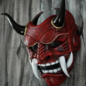 Japanese Hannya mask with red face, black horns, and white tusks for Halloween cosplay