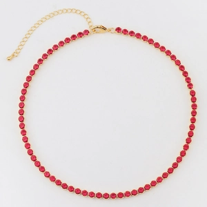 Detail of red zircon choker necklace with gold claw setting and adjustable chain