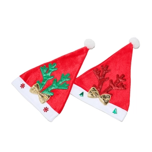 Christmas hats with sequins reindeer antlers and snowflake patterns on white background
