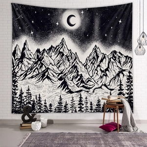 Detail showing high-quality black and white mountain tapestry with moon and starry sky