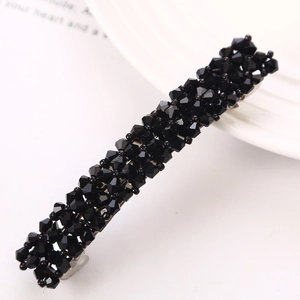 Elegant black faceted crystal beaded hair clip with silver base on white background